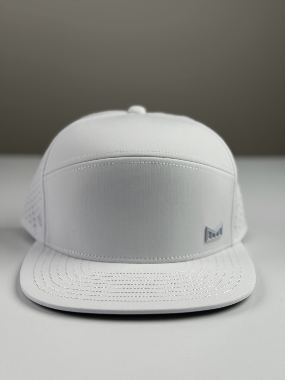 Melin Trenches Icon Hydro Performance Snapback Hat in White, Classic